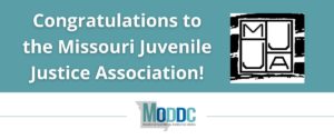 teal background with text in white "Congratulations to the Missouri Juvenile Justice Association!" MJJA black and white logo. MODDC logo. Missouri Developmental Disabilities Council.